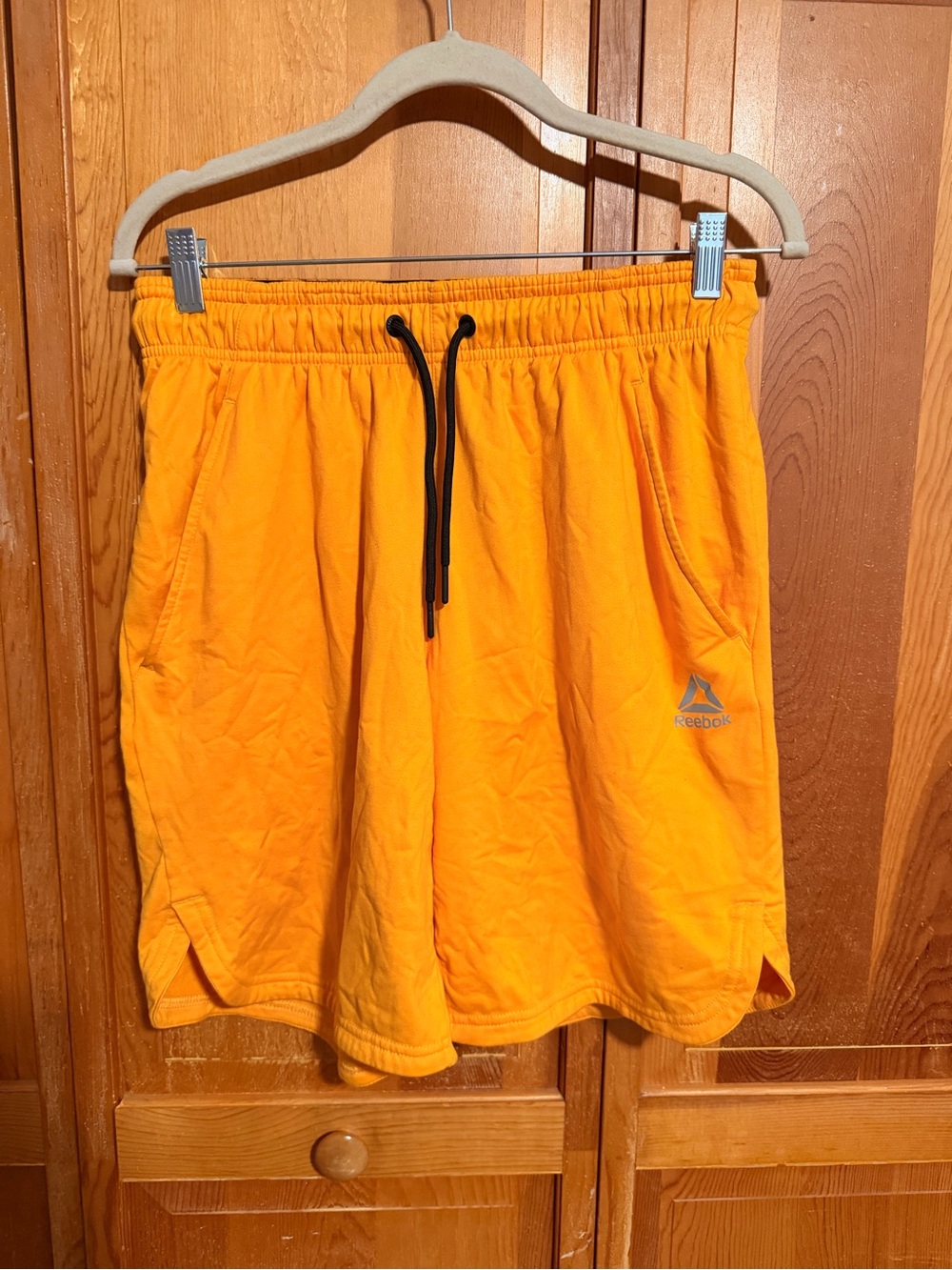 Reebok Men’s Bright Orange Athletic Shorts with Black Drawcord